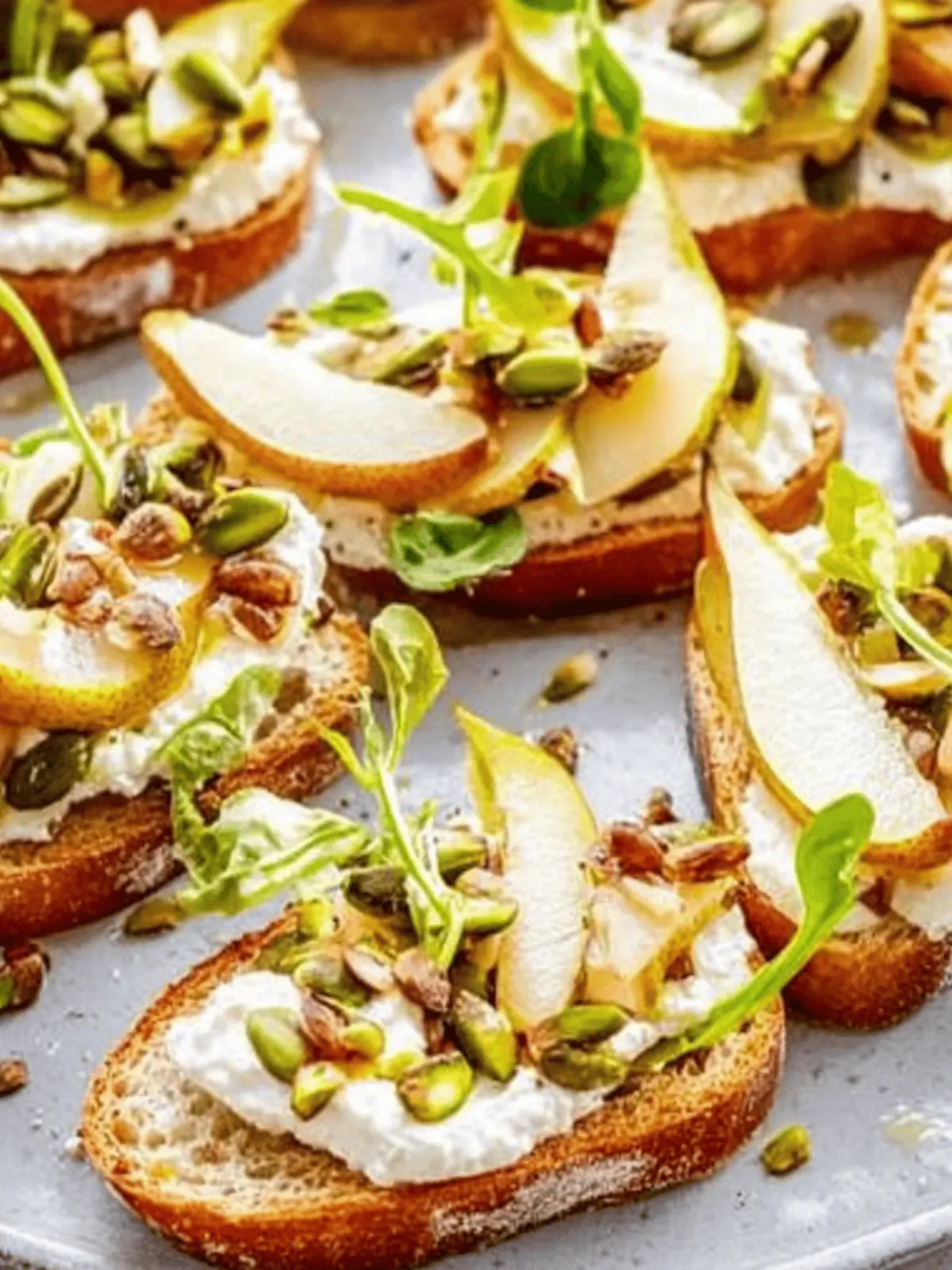 Delicious Ricotta and Pear Crostini with Nutty Crunch Delight 5 Ricotta and Pear Crostini with Salty Pumpkin Seed Pistachio Crunch